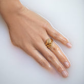 product_details::Gold Align Band and Yellow Diamond Balanced Ring on model.