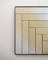 Closeup details of the Bower Studios Lattice Mirror 2 on light color background.