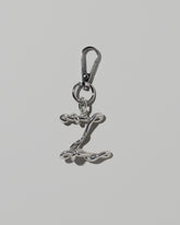CRZM Sterling Silver Letter Z Bag Charm with Clip on light color background.