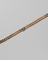 Closeup details of the Identity Chain Bicolor Tanzanite Bracelet 002 on light color background.