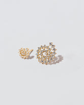 Mini and Full Spiral Earring Single Studs on light colored background.