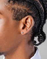 Sapphire Sun & Moon Stud Earrings on male model.