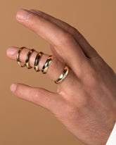 Gold Knife Edge Bands on model.