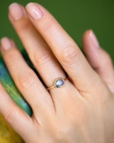 Gusher Blue Sapphire Ring 023 on model.