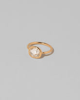 View from the side of the Gusher Diamond Ring 006 on light color background.