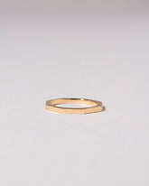 Gold Solid 1.7mm Segmented Half Hoop Band on light color background.