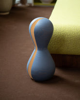 Styled image featuring the Pat Kim Blue Slice.