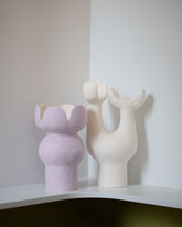 Stephanie Phillips Lovis Sculpture and Stephanie Phillips Lilac Tulip Sculpture on light color background.