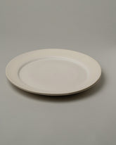 Tracie Hervy Dinner Plates Set on light color background.