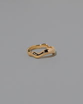 View from the side of the Gold Equalize Band on light color background.