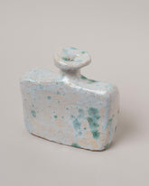 Closeup details of the Willem van Hooff Oxley Tiny Core Vessel on light color background.