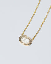 Simplicity Intaglio Seal Necklace on light color background.