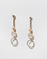 Act 3. Earrings on light color background.