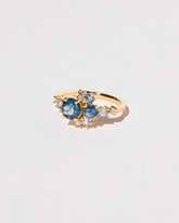 Montana Sapphire Crescent Ring on light color background.