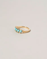 Five Triangle Ring - Turquoise on light color background.