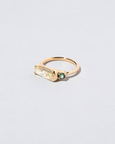 Immanence Ring on light color background.