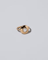 Exposition Ring on light colored background.