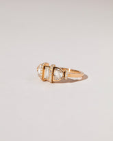 Abundance Ring on light color background.