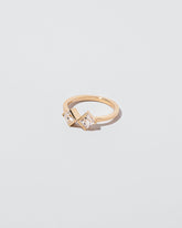 Rise & Fall Ring on light color background.