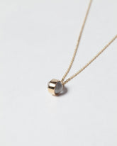 Birthstone Necklace on light color background.