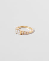 Elpis Ring on light color background.