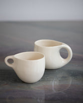 Styled image featuring Dust and Form Ritual Mug and Small Cream Comfort Mug.