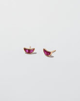 Fury Earrings on light color background.