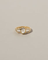 Modified Brilliant Diamond Ring on light color background.