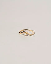 Mini Peak Ring on light color background.