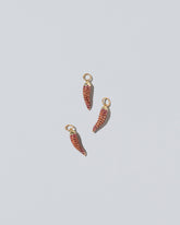 Chili Pepper Charm - Pavés on light color background.
