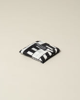 Baggu Black Mociun Aerograph Print Baggu pouch on light color background.