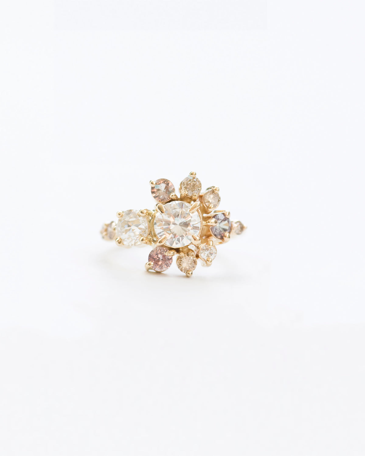 White diamond and color change sapphire stone cluster ring front view