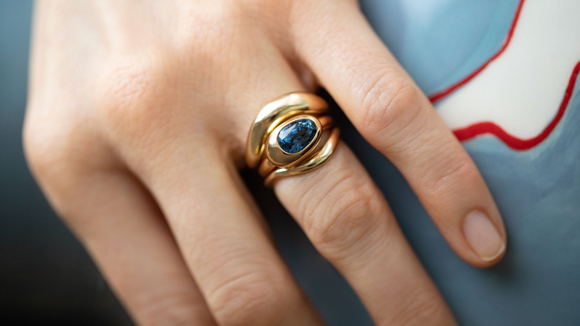 Wide Level Band, Spinel Grand Align Ring and Thin Level Band on model.