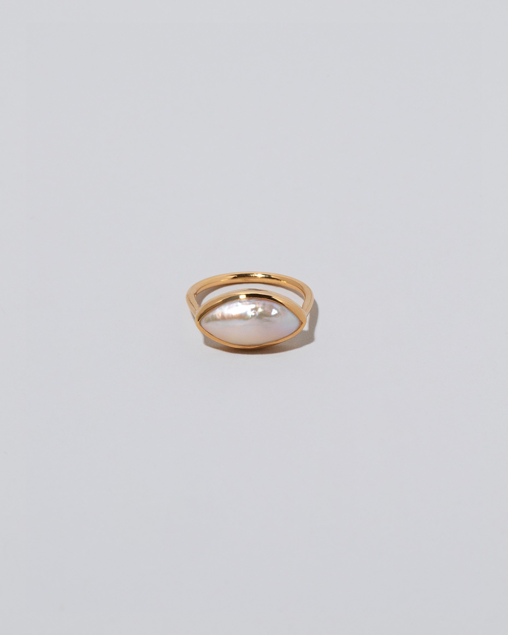 18k Gold Jacana Pearl Ring on light color background.