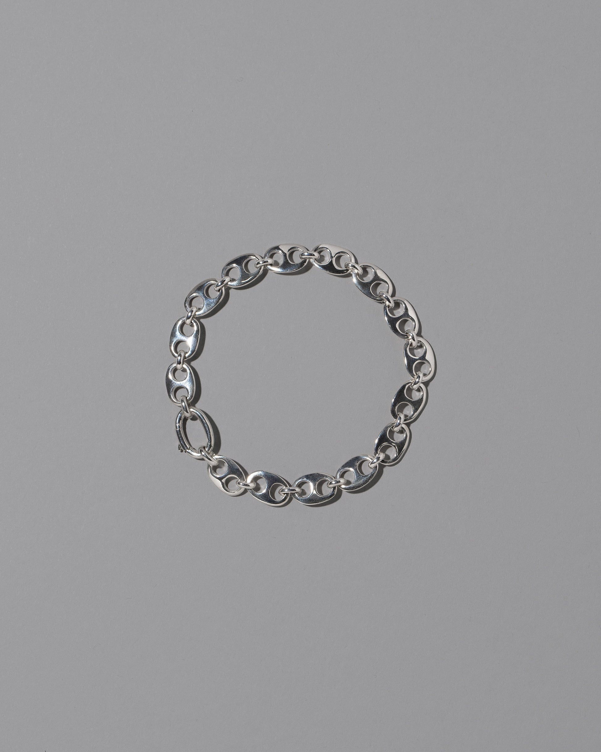 CRZM Sterling Silver Mini Yuba Bracelet on light color background.