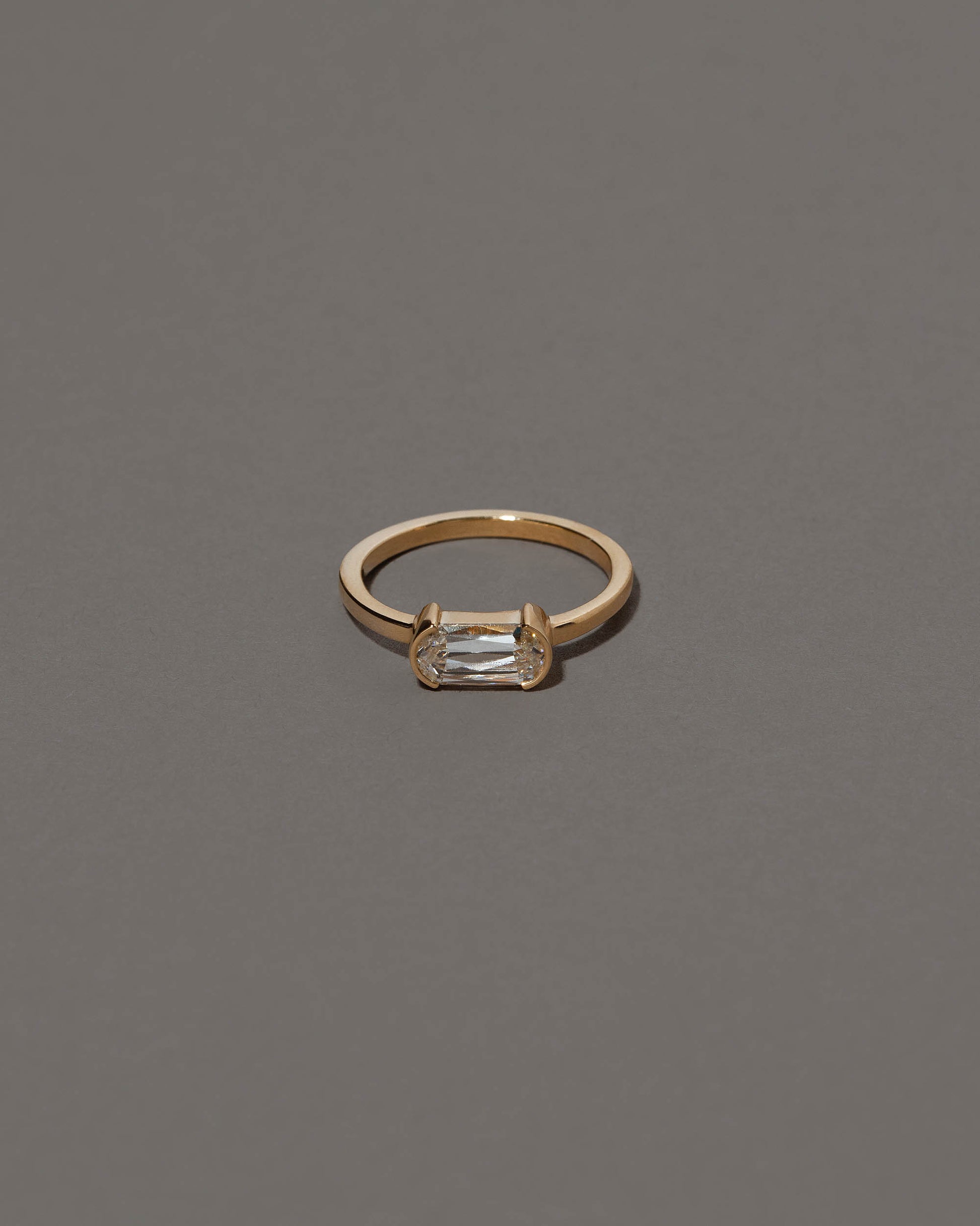 Conviviality Ring on grey color background.