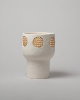 Stephanie Phillips Cream Rattan Vessel on light color background.