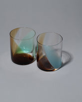 Group of Bow Glassworks Lakeside Splash Cups on light color background.