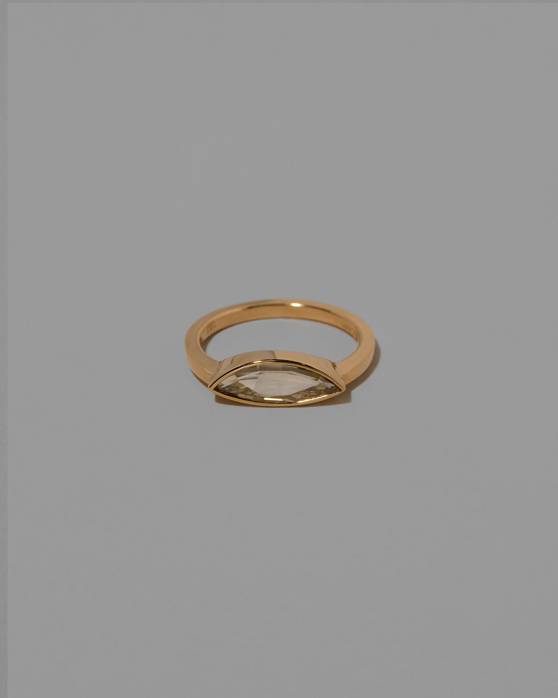 Tenderness Ring on light color background.