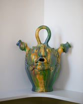 Apotropaia Large Head Flask on light color background.