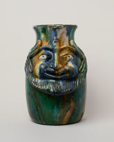 Apotropaia Large Head Pitcher on light color background.