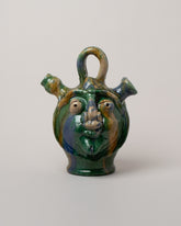 Apotropaia Small Head Flask on light color background.