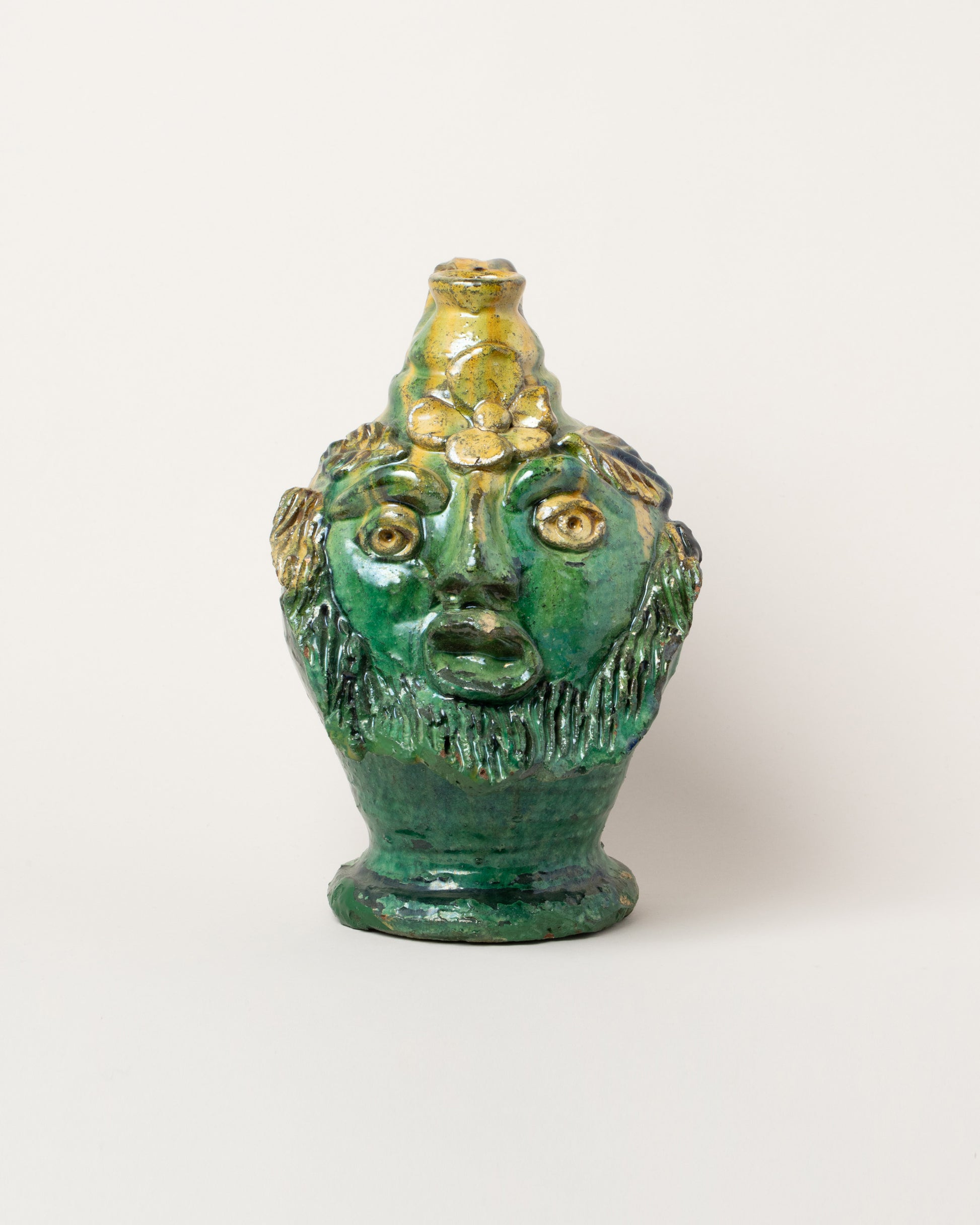 Apotropaia Small Head Jug on light color background.