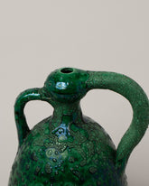 Closeup details of the Apotropaia Crackled Handled Vessel on light color background.