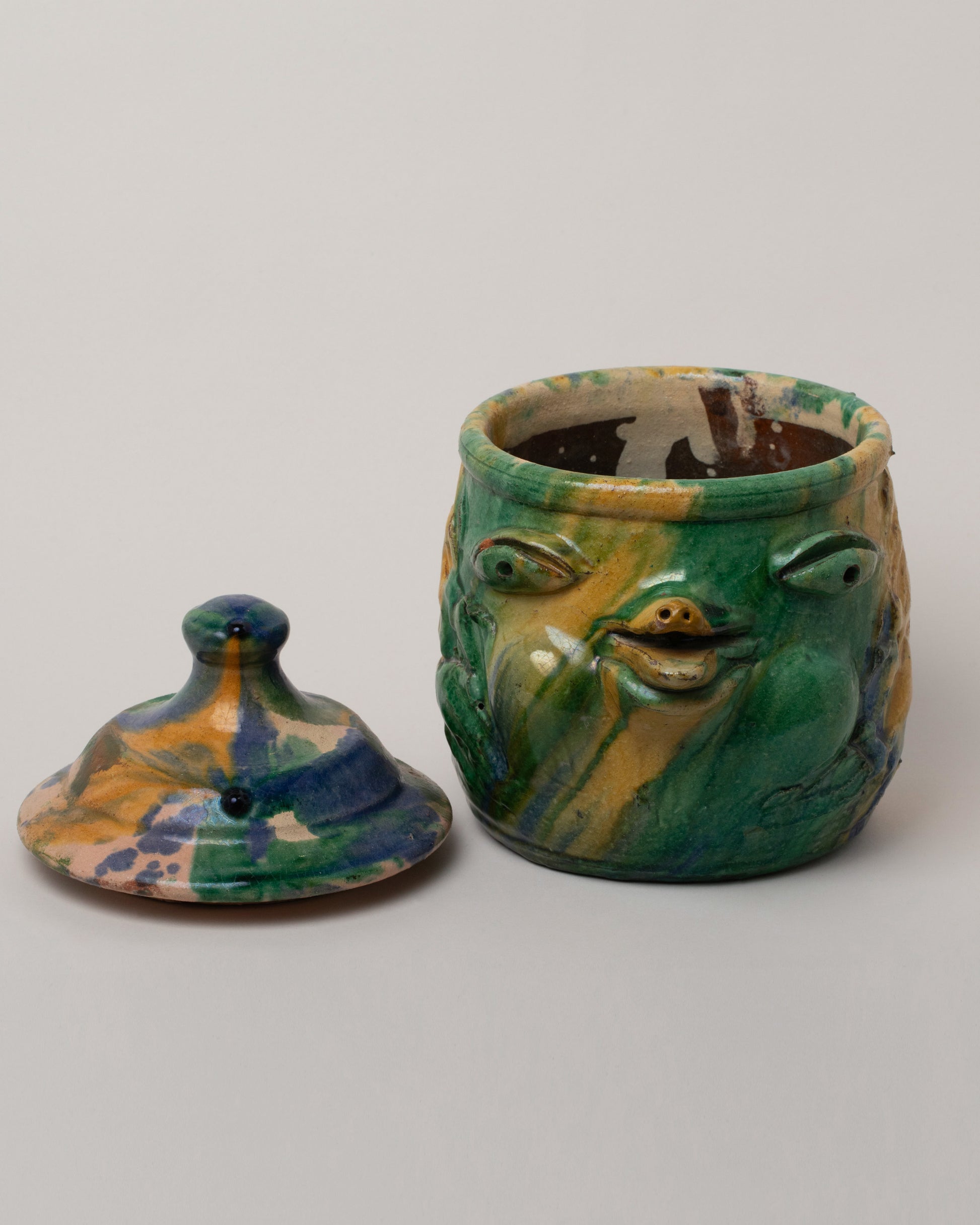 Detail view of the Apotropaia Head Jar on light color background.