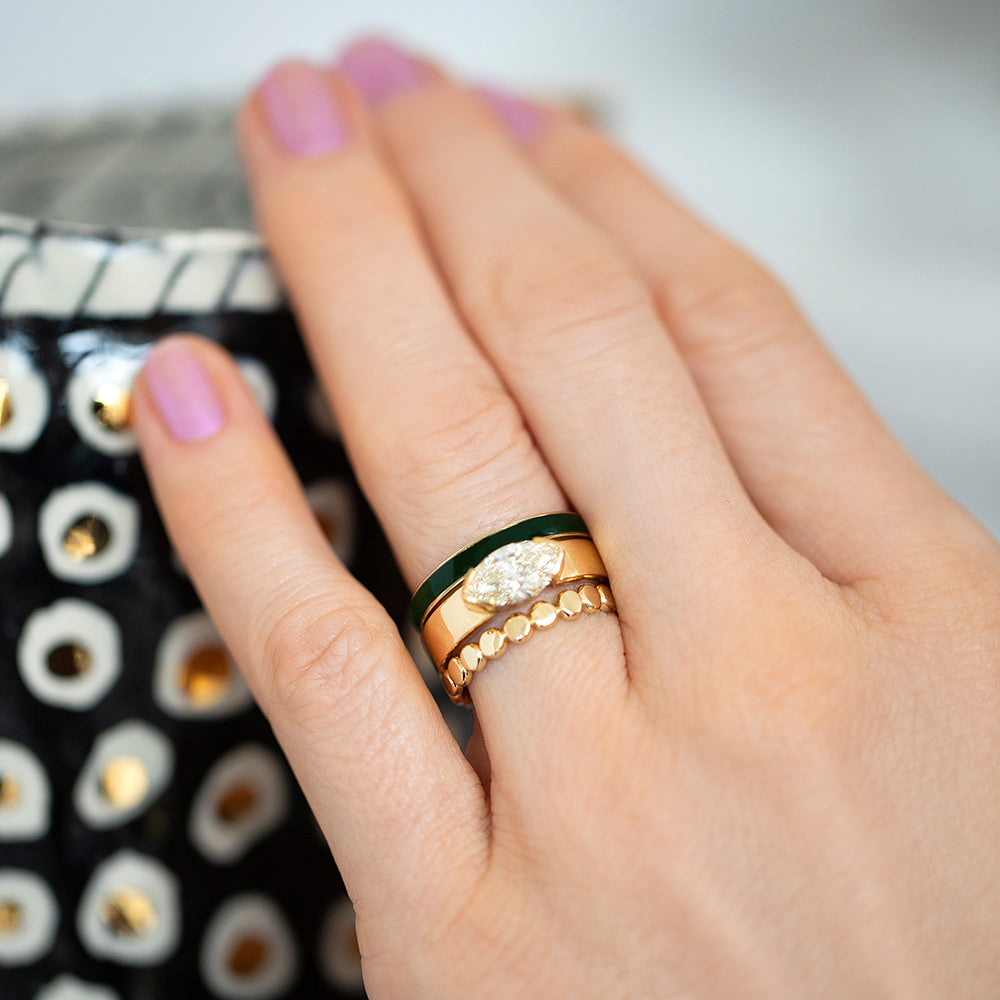 product_details::Gold Veridian 4mm Enamel Band, Positivism Ring and Gold One Tier Mimosa Band on model.