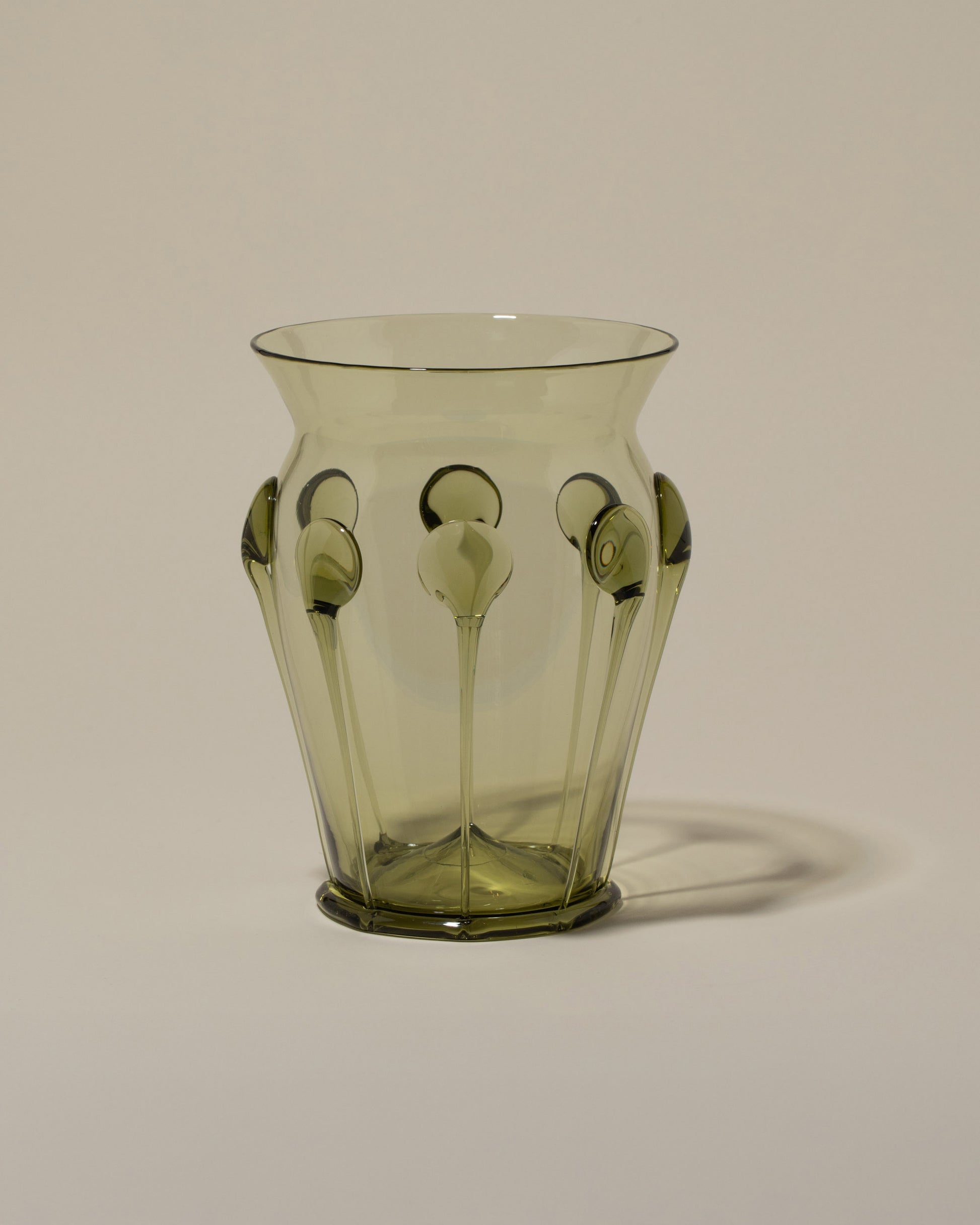 Bollenglass Design Green Drip Vase on light color background.