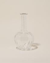 Bollenglass Design Spiral Bud Vase on light color background.