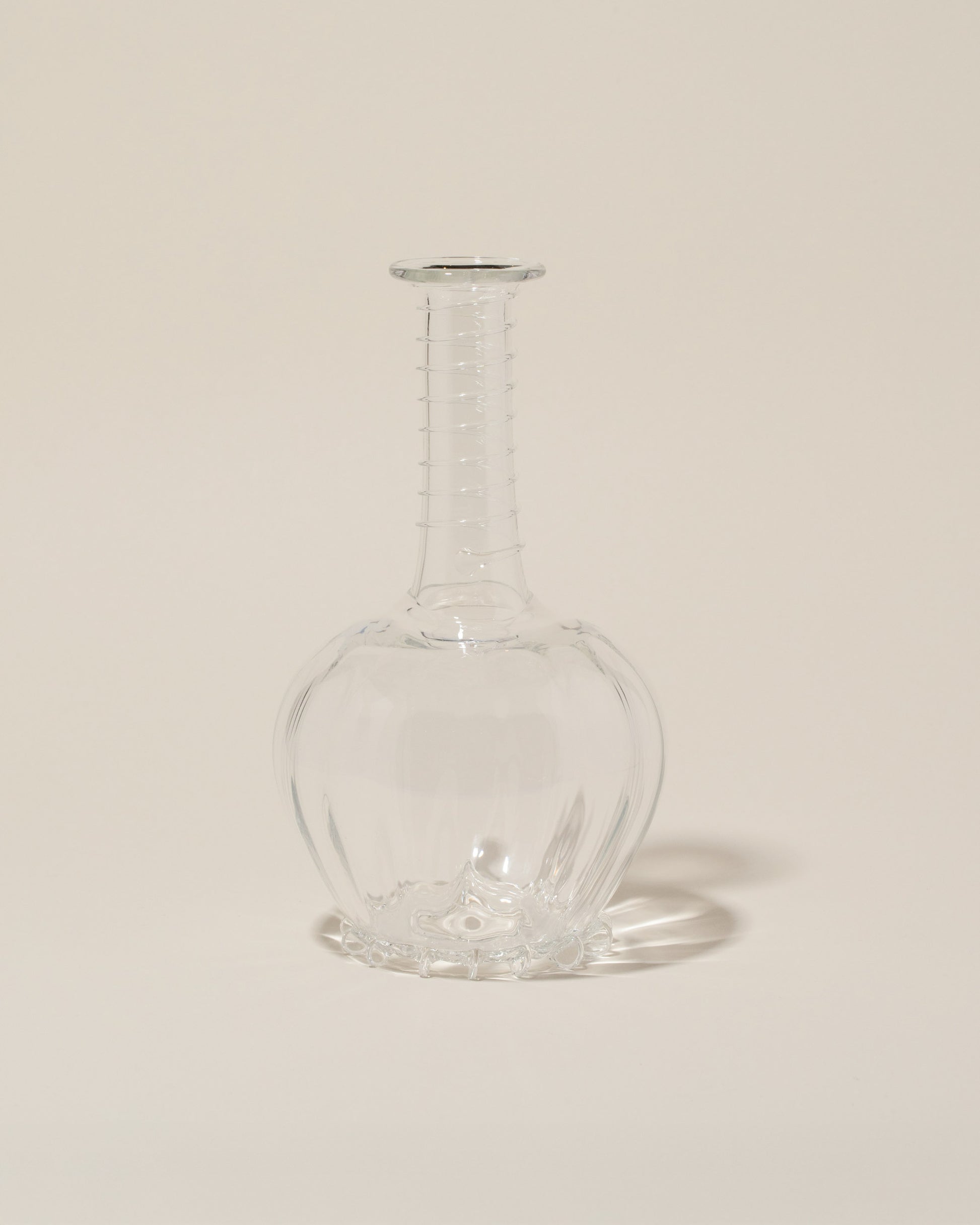 Bollenglass Design Spiral Bud Vase on light color background.