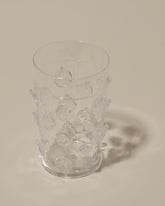 Closeup details of the Bollenglass Design Clear Dot Beer Glass on light color background.